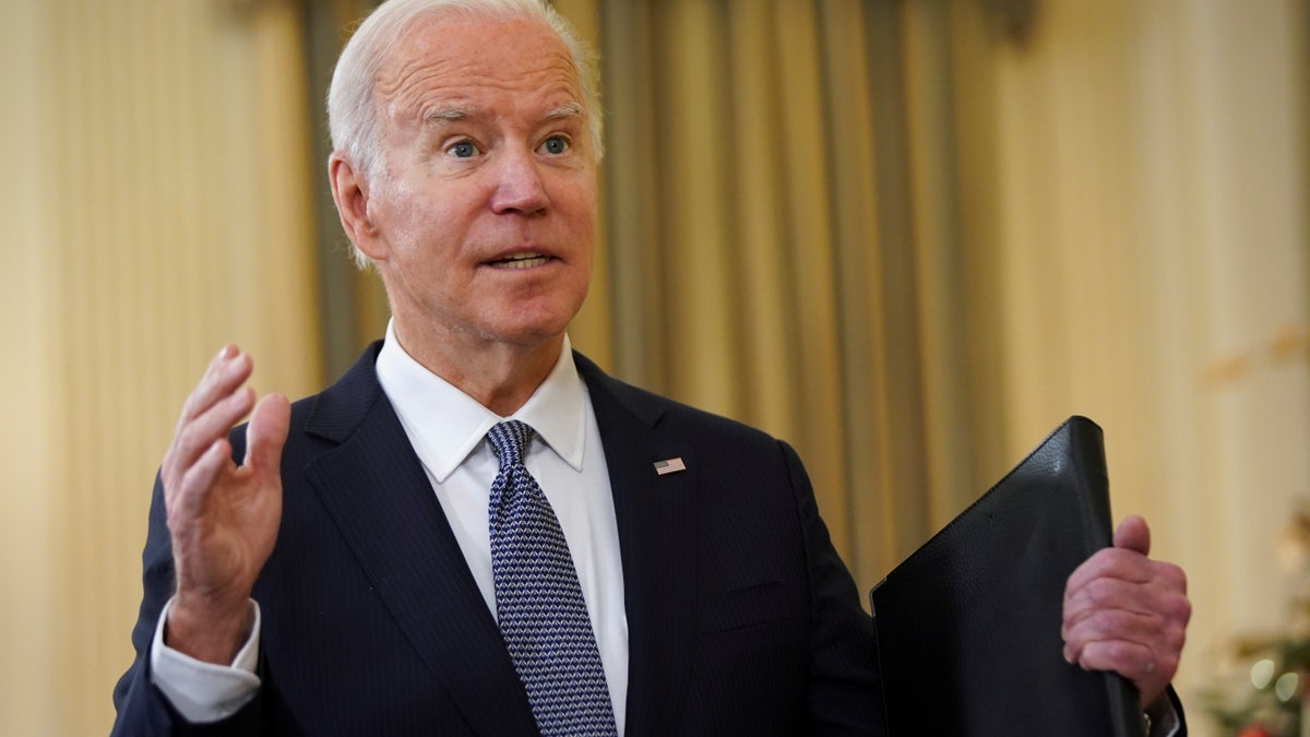President Joe Biden speaks with reporters after delivering remarks on the November jobs report at the White House on Dec. 3, 2021. (Reuters/Kevin Lamarque)