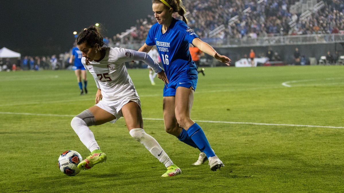 Emily Madril dribbles soccer ball