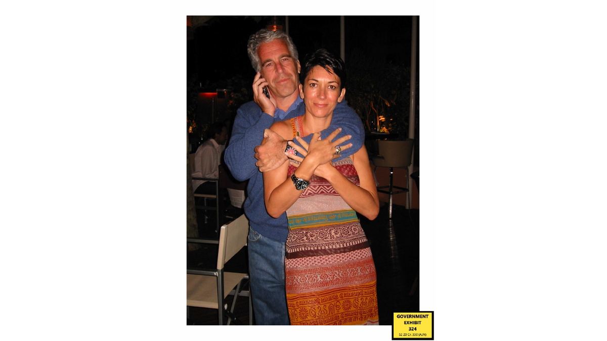 Jeffrey Epstein hugging Ghislaine Maxwell from behind in an undated evidence photo