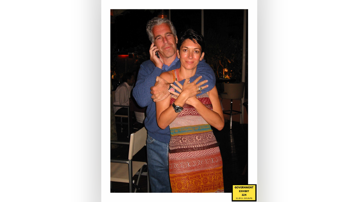 Jeffrey Epstein hugging Ghislaine Maxwell from behind in an undated evidence photo