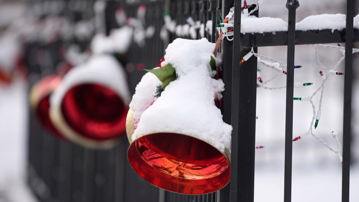 The snowfall was the first in 232 consecutive days in Denver, the second-longest snowless streak in city history only eclipsed by the mark of 235 days set in 1887. (AP Photo/David Zalubowski)