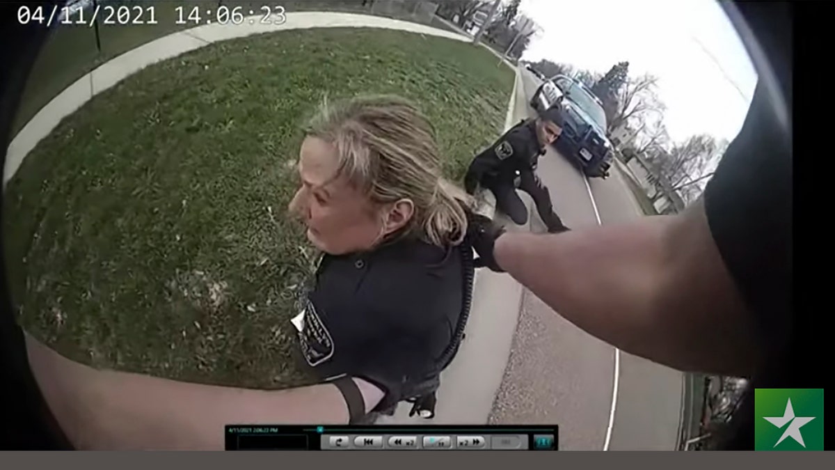In this screen grab, police body cam video is shown in court on Friday, Dec. 10, 2021 at Hennepin County Courthouse in Minneapolis, Minnesota, of former Brooklyn Center Police Officer Kim Potter reacting after a traffic stop in which Daunte Wright was shot on April 11, 2021. 