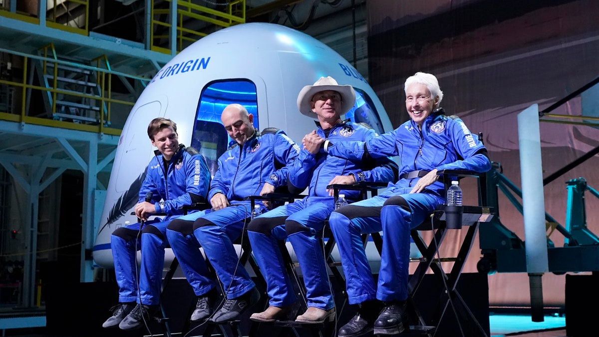 Oliver Daemen, from left, Mark Bezos, Jeff Bezos, founder of Amazon and space tourism company Blue Origin, and Wally Funk