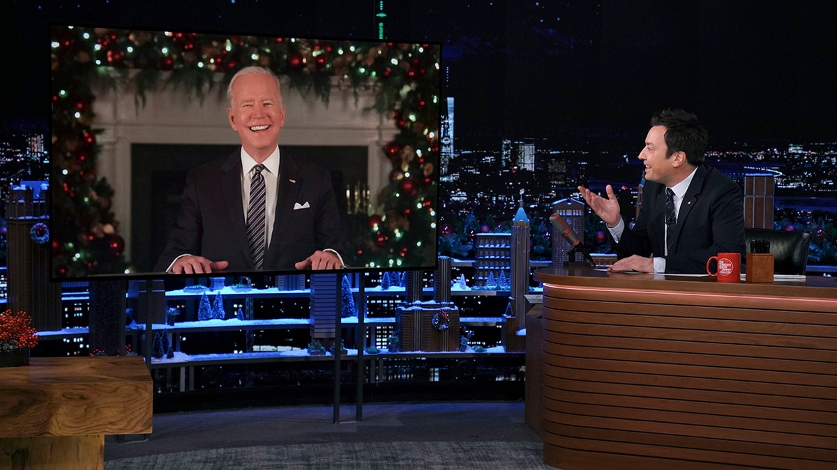 President Joe Biden is shown on a screen during a virtual interview with host Jimmy Fallon on "The Tonight Show Starring Jimmy Fallon," Friday, Dec. 10, 2021, in New York City. 