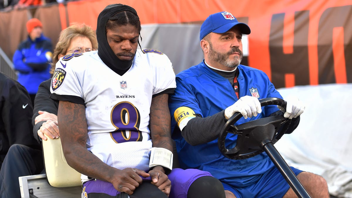 Baltimore Ravens quarterback Lamar Jackson (8) is carted off the field after an injury during the first half against the Cleveland Browns, Sunday, Dec. 12, 2021, in Cleveland. 