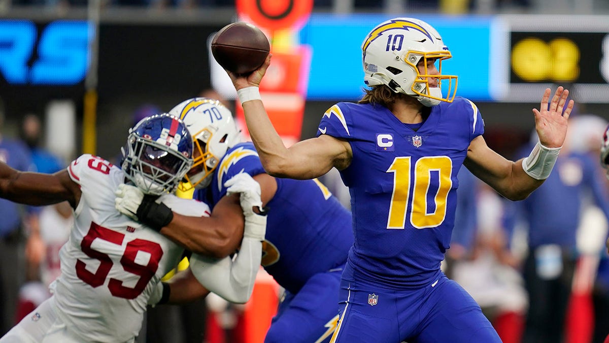 Los Angeles Chargers quarterback Justin Herbert throws against the New York Giants 