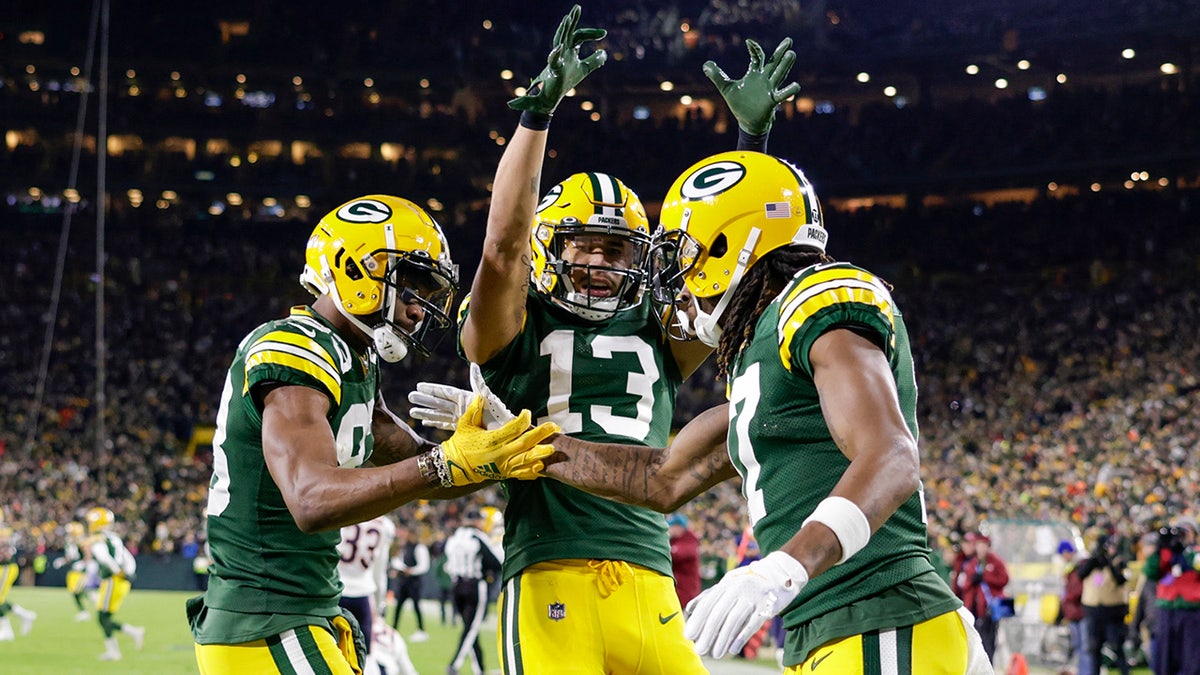 Packers' Davante Adams celebrates his touchdown catch against the Chicago Bears Sunday, Dec. 12, 2021, in Green Bay, Wisconsin. (AP Photo/Matt Ludtke)