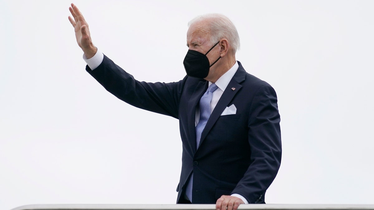 President Joe Biden waves as he boards Air Force One at Columbia Metropolitan Airport in West Columbia, S.C., en route to Philadelphia after speaking at the South Carolina State University's 2021 Fall Commencement Ceremony in Orangeburg, S.C., Friday, Dec. 17, 2021.