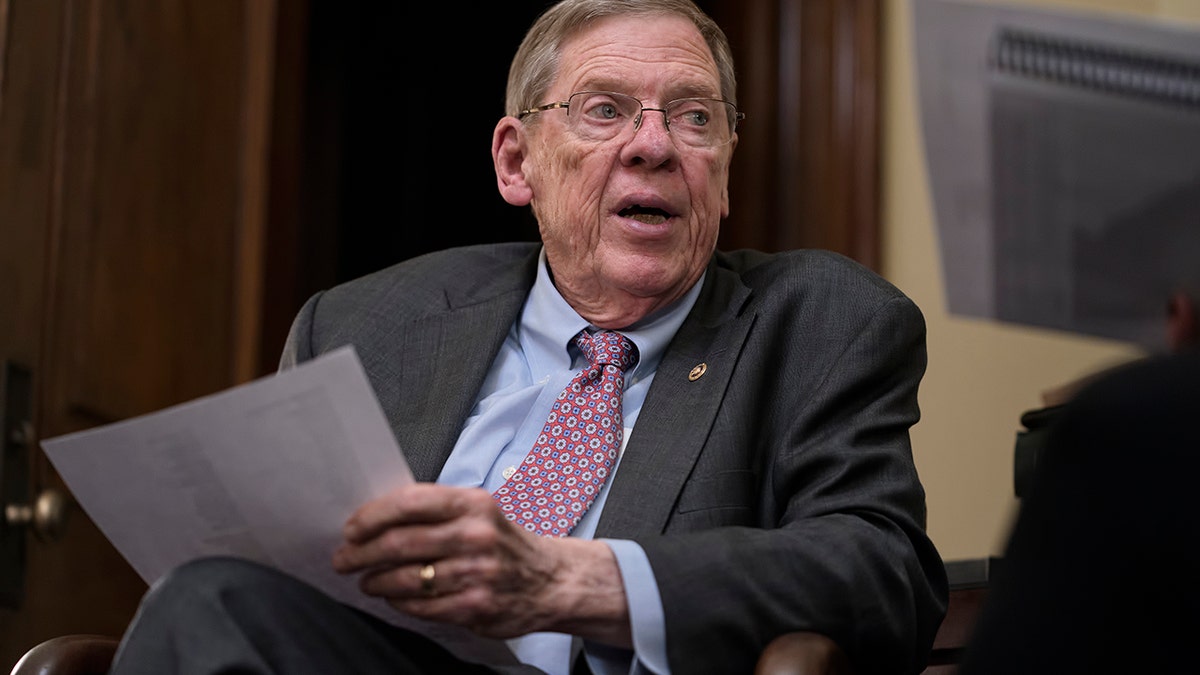 FILE - Sen. Johnny Isakson, R-Ga., meets with his staff in his office on Capitol Hill in Washington, Dec. 2, 2019. Isakson, an affable Georgia Republican politician who rose from the ranks of the state Legislature to become a U.S. senator, has died. He was 76. Georgia Gov. Brian Kemp’s office confirmed the death in a news release Sunday, Dec. 19, 2021. (AP Photo/J. Scott Applewhite, file)