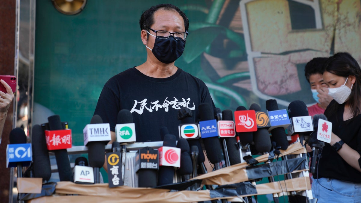 Spokesperson of Hong Kong Alliance in Support of Patriotic Democratic Movements of China, Richard Tsoi speaks to media after the group announced that it's disbanded in Hong Kong, Saturday, Sept. 25, 2021. (AP Photo/Kin Cheung, File)