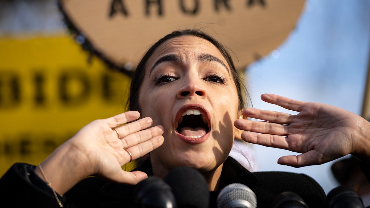Rep. Alexandria Ocasio-Cortez, D-N.Y., speaks during a rally for immigration provisions to be included in the Build Back Better Act outside the U.S. Capitol, Dec. 7, 2021 in Washington.