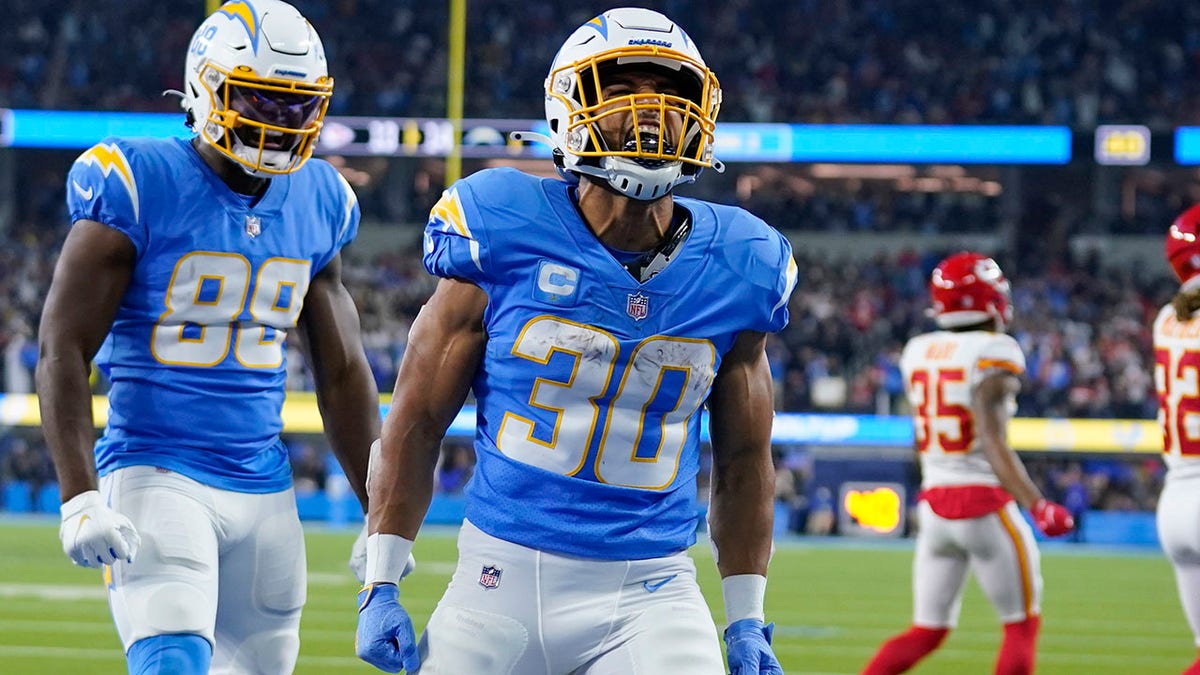 Los Angeles Chargers running back Austin Ekeler (30) reacts after scoring a touchdown during the second half of an NFL football game against the Kansas City Chiefs, Thursday, Dec. 16, 2021, in Inglewood, Calif.