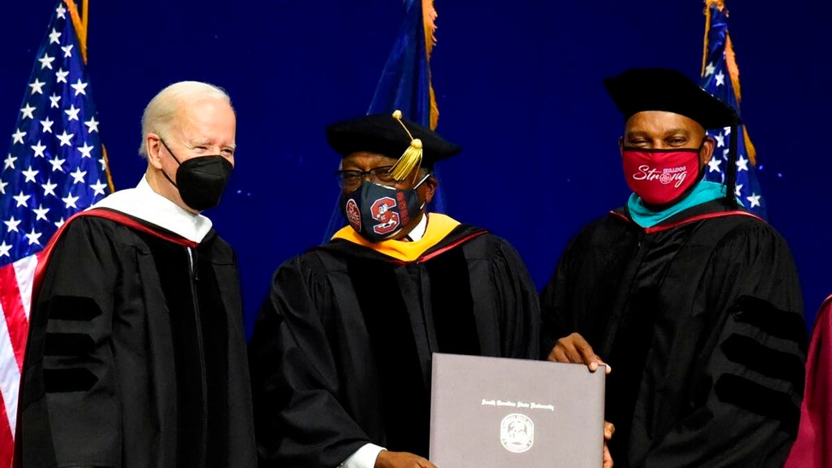 President Biden helps present diploma to Rep. Jim Clyburn