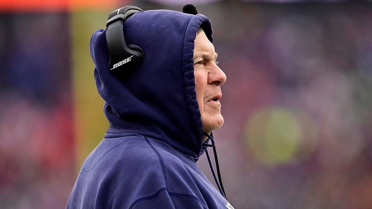 Head coach Bill Belichick of the New England Patriots looks on from the sidelines during the second quarter against the Buffalo Bills at Gillette Stadium on Dec. 26, 2021, in Foxborough, Massachusetts.