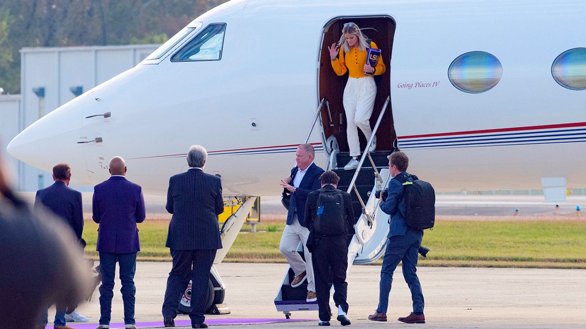 New LSU football coach Brian Kelly steps off a plane after arriving at Baton Rouge Metropolitan Airport, Tuesday, Nov. 30, 2021. Kelly, formerly of Notre Dame, is said to have agreed to a 10-year contract with LSU worth $95 million, plus incentives. 