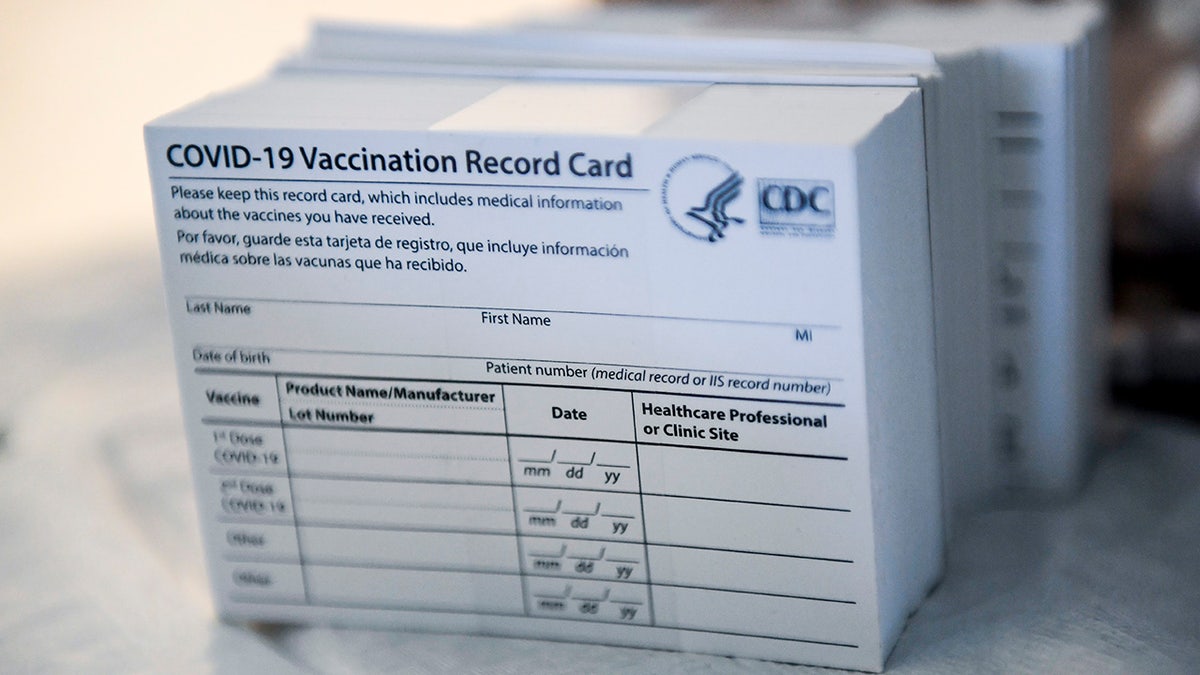 Blandon, PA - April 14: A stack of COVID-19 Vaccination Record Cards from the CDC. At the Giorgio Companies site in Blandon, PA where the CATE Mobile Vaccination Unit was onsite to administer Moderna COVID-19 Vaccines to workers Wednesday morning April 14, 2021. The effort was a collaboration between the Latino Connection, the Pennsylvania Department of Health, Highmark Blue Shield, and the Independence Blue Cross Foundation. (Photo by Ben Hasty/MediaNews Group/Reading Eagle via Getty Images)