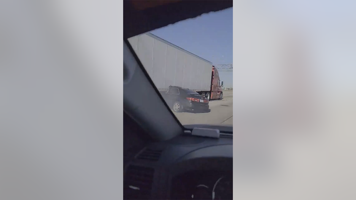 Tractor-trailer drags sedan down Illinois highway 