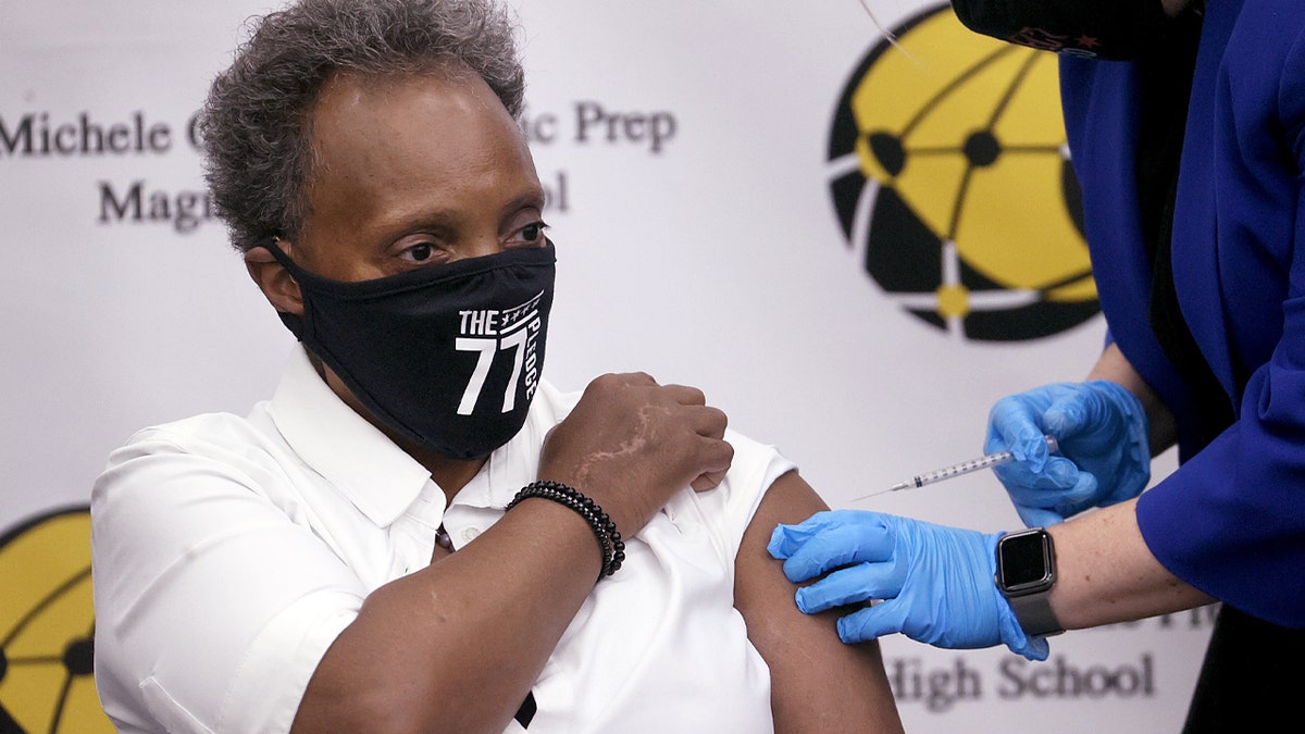 Chicago Mayor Lori Lightfoot gets a COVID-19 booster vaccine at Michele Clark High School on Nov. 12, 2021 in Chicago.