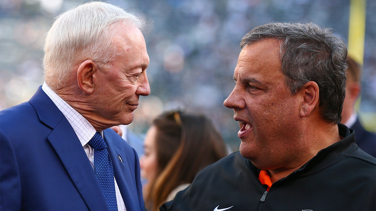 Dallas Cowboys owner Jerry Jones (left) and Former New Jersey Gov. Chris Christie talk prior to the National Football League game between the New York Jets and the Dallas Cowboys on Oct. 13, 2019, at MetLife Stadium in East Rutherford, New Jersey.