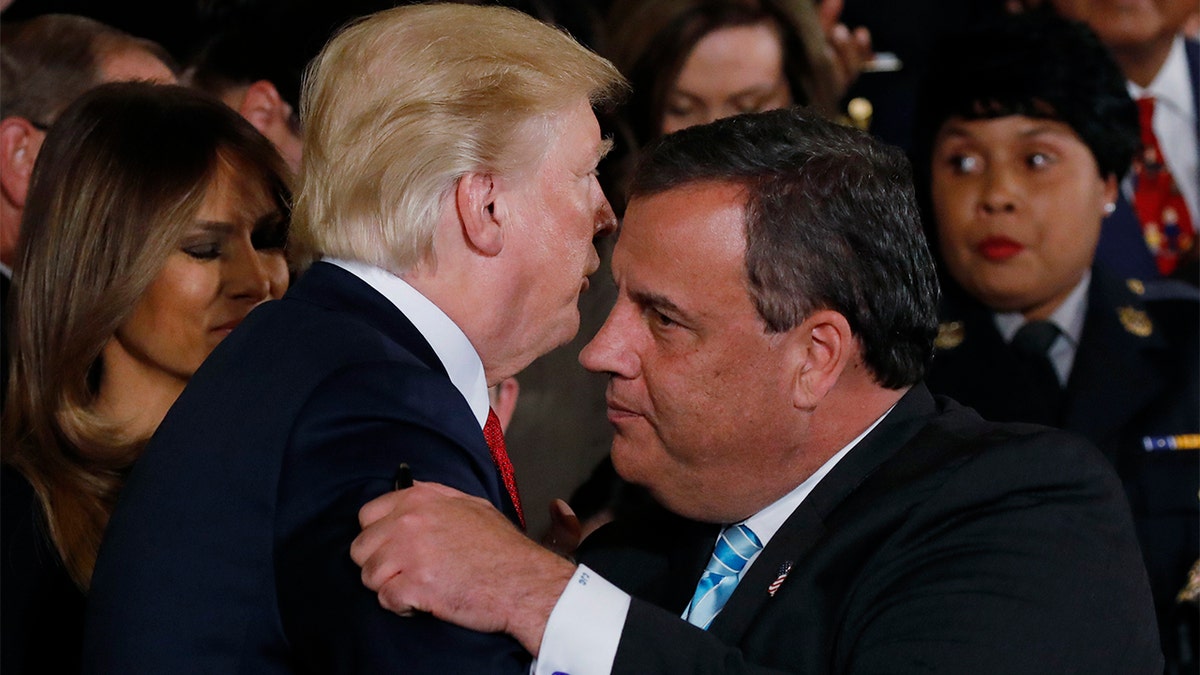 President Trump greets New Jersey Gov. Chris Christie after speaking about administration plans to combat the nation's opioid crisis in the East Room of the White House in Washington, Oct. 26, 2017.