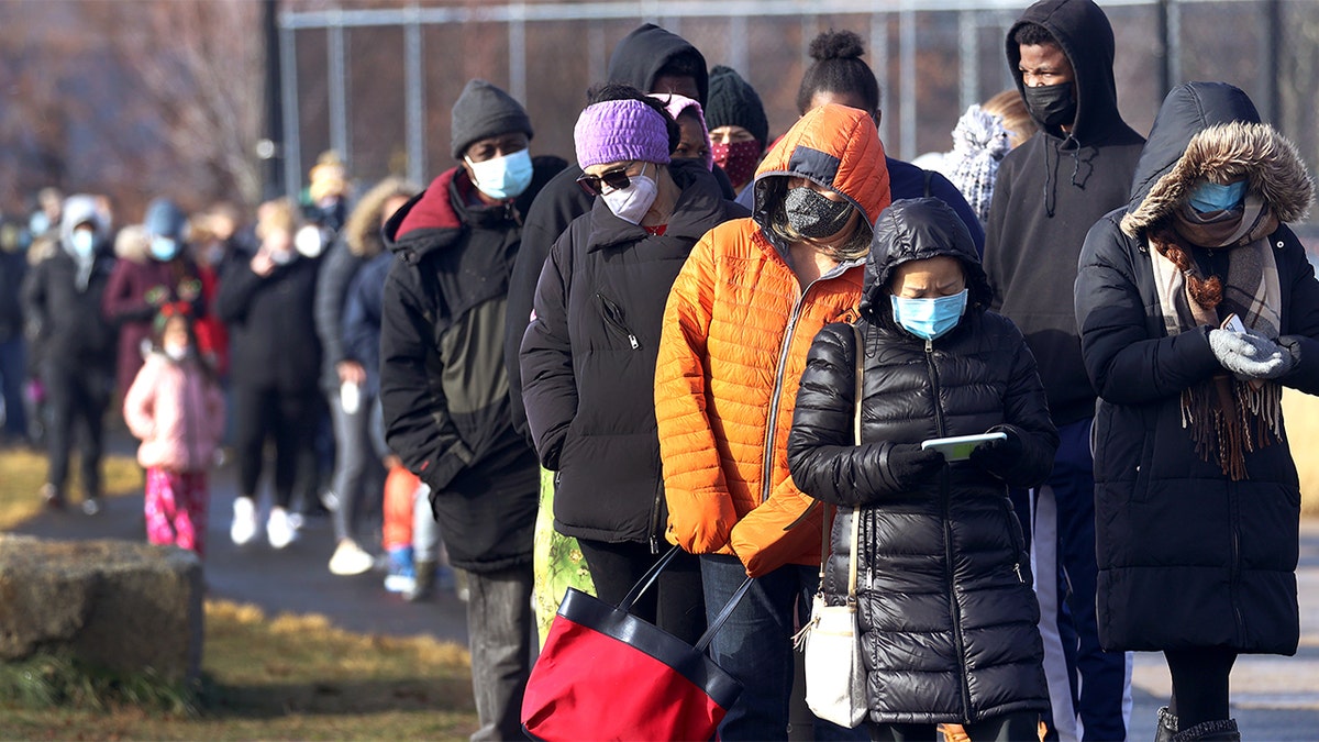Everett, MA - December 28: Long COVID testing lines at Rivergreen Park in Everett, MA on December 28, 2021. (Photo by David L. Ryan/The Boston Globe via Getty Images)