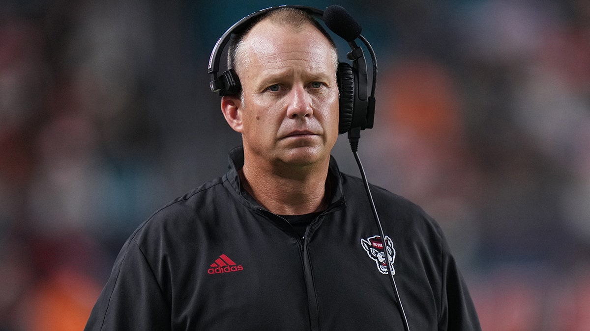 Head coach Dave Doeren of the North Carolina State Wolfpack looks on during the game against the Miami Hurricanes in the first half at Hard Rock Stadium on Oct. 23, 2021, in Miami Gardens, Florida.