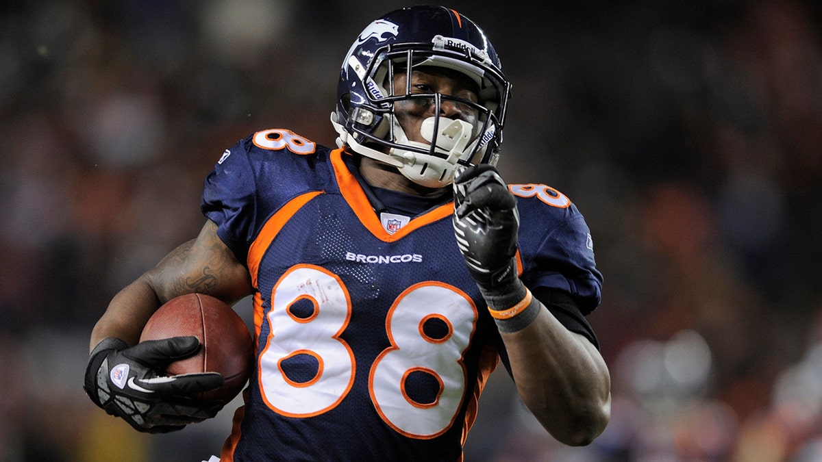 Denver Broncos wide receiver Demaryius Thomas runs on his way to scoring the winning touchdown in overtime during their NFL AFC wildcard playoff football game against the Pittsburgh Steelers in Denver, Colorado, January 8, 2012.