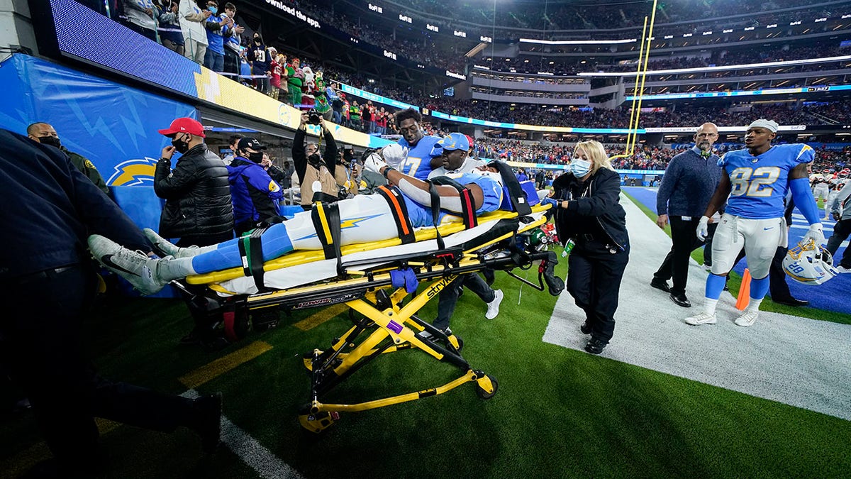 Los Angeles Chargers tight end Donald Parham leaves the field on a stretcher after an injury during the first half of an NFL football game against the Kansas City Chiefs, Thursday, Dec. 16, 2021, in Inglewood, Calif.