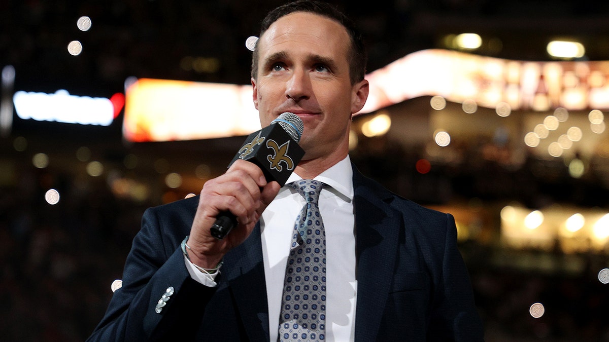 Former Saints quarterback Drew Brees speaks to the fans during halftime of the game between the Buffalo Bills and the Saints at Caesars Superdome on Nov. 25, 2021, in New Orleans, Louisiana.