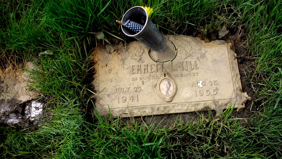 The mud-caked grave marker for 14-year-old Emmett Till, whose murder in Mississippi in 1955 is considered one of the events that accelerated the Civil Rights Movement, on May 5, 2009, in Burr Oak Cemetery in Alsip, Ill. 