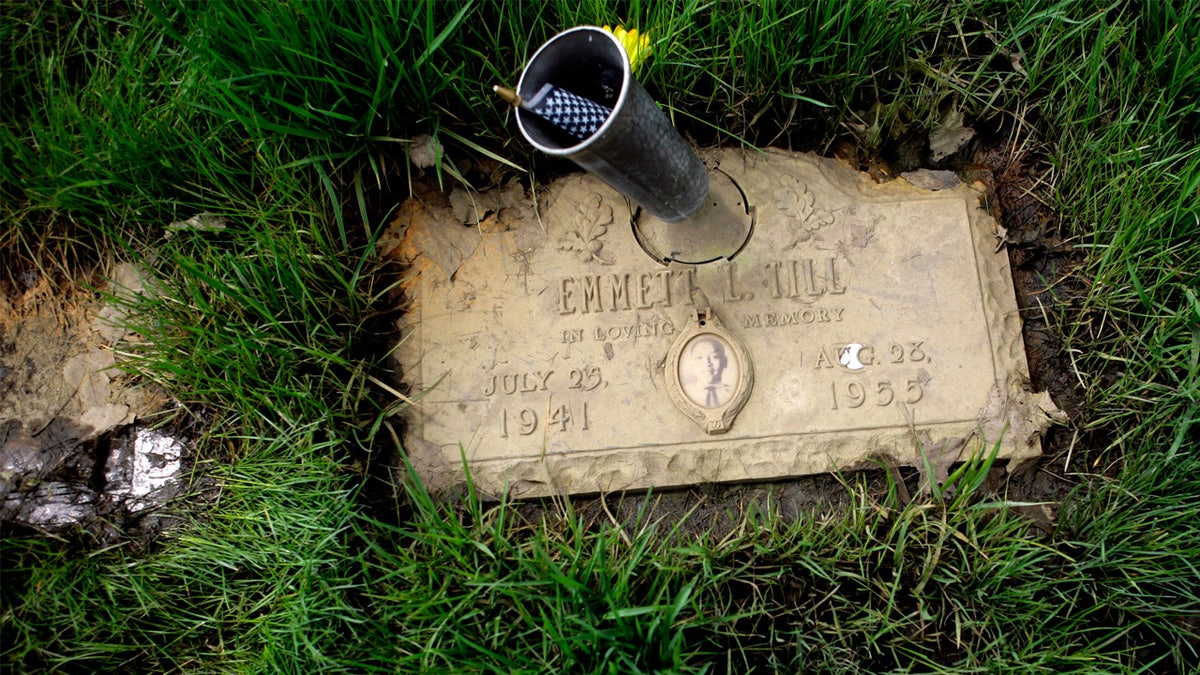 The mud-caked grave marker for 14-year-old Emmett Till, whose murder in Mississippi in 1955 is considered one of the events that accelerated the Civil Rights Movement, on May 5, 2009, in Burr Oak Cemetery in Alsip, Ill.