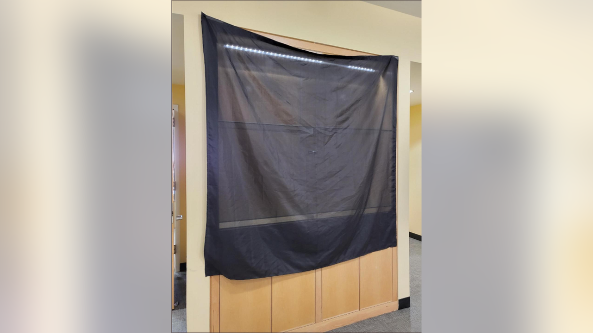 The empty display case that had previously held the "holiday reading display" at the Dolley Madison Library. 