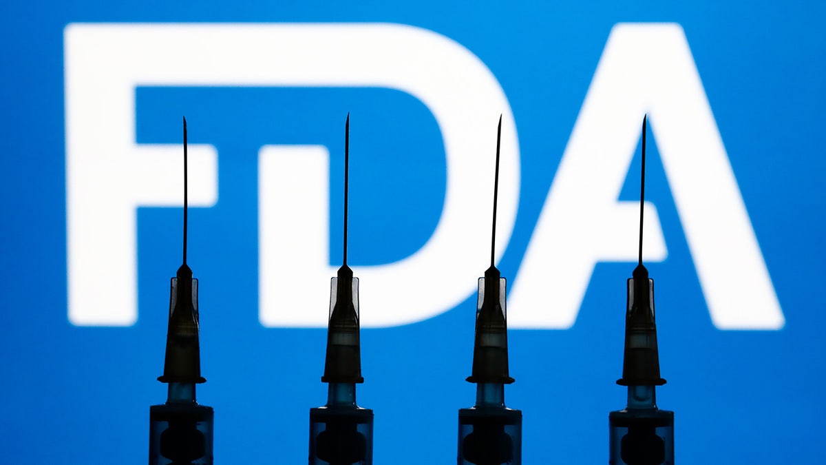 FDA logo with three medical syringes in front of it