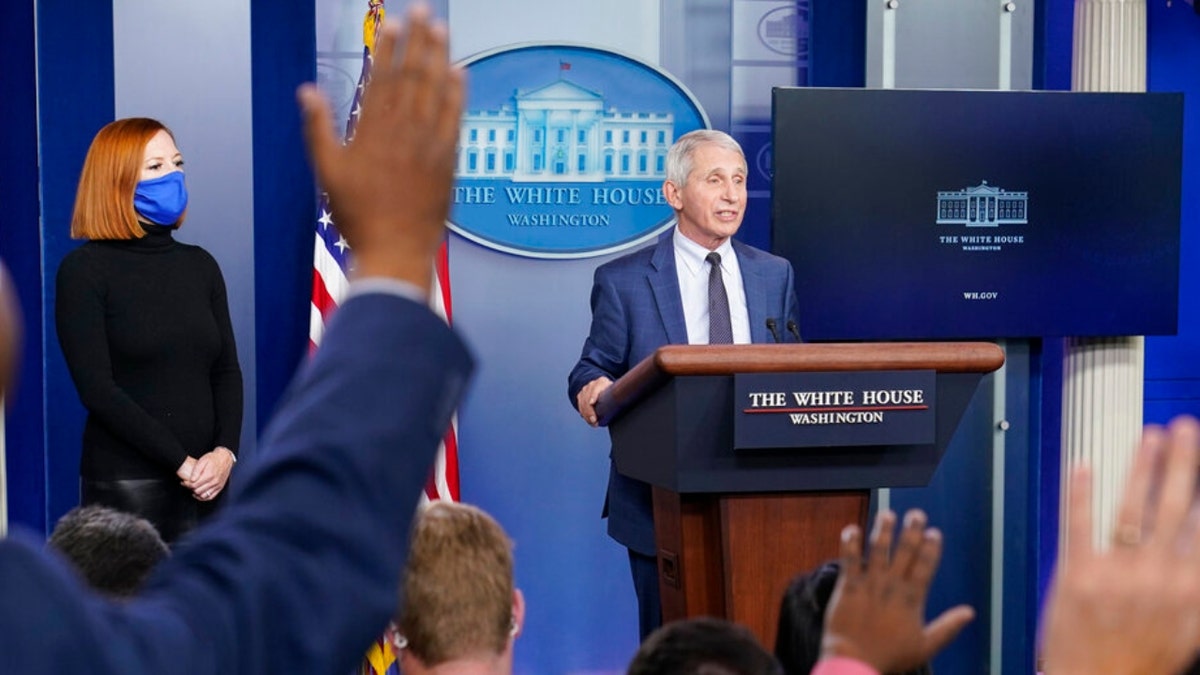 Dr. Anthony Fauci, director of the National Institute of Allergy and Infectious Diseases, speaks during the daily briefing at the White House in Washington, Wednesday, Dec. 1, 2021, as White House press secretary Jen Psaki watches. 