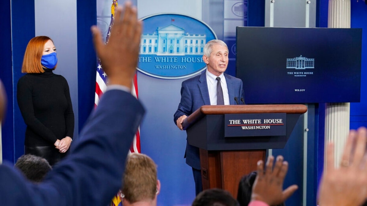 Dr. Anthony Fauci, director of the National Institute of Allergy and Infectious Diseases, speaks during the daily briefing at the White House in Washington, Wednesday, Dec. 1, 2021, as White House press secretary Jen Psaki watches. (AP Photo/Susan Walsh) 