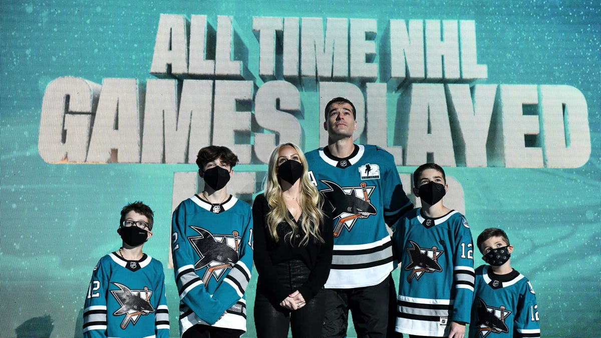 Patrick Marleau of the San Jose Sharks and his family look up at the video board as he is honored for having passed Gordie Howe on the NHL's all-time games played list before the game against the Minnesota Wild at SAP Center on April 24, 2021, in San Jose, California.