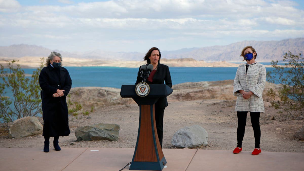 Congresswoman Dina Titus (D-NV) and Nevada Representative Susie Lee listen as Vice President Kamala Harris speaks to the media at Lake Mead National Recreation Area on October 18, 2021, in Boulder City, Nevada. 