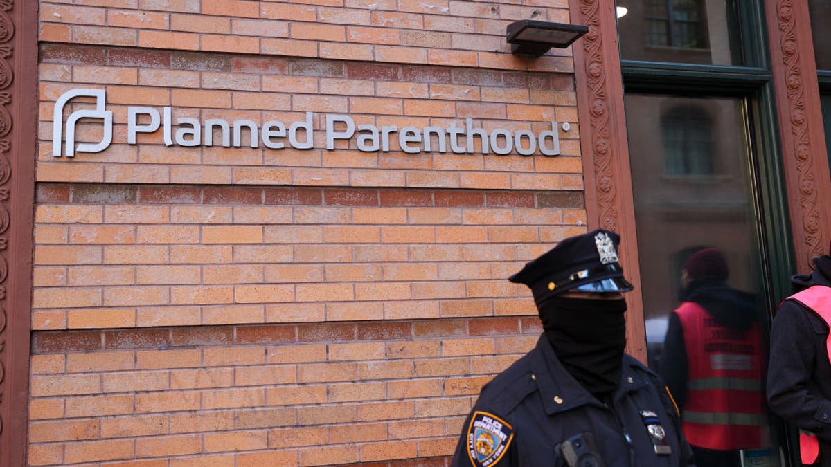 Basilica of St. Patrick's Old Cathedral churchgoers and members gather outside the Planned Parenthood clinic to support abortion law in New York City on Dec. 4, 2021. 