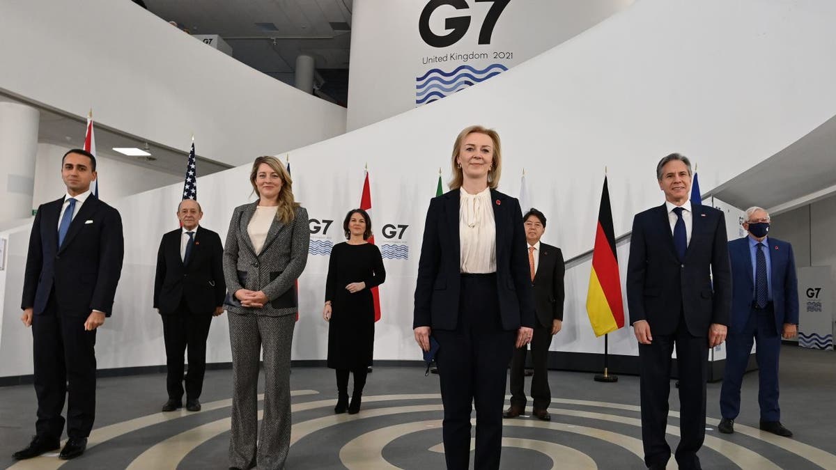 LIVERPOOL, ENGLAND - DECEMBER 11: (L-R) G7 foreign ministers pose for a group photograph ahead of bilateral talks at the G7 Foreign and Development Ministers meeting 