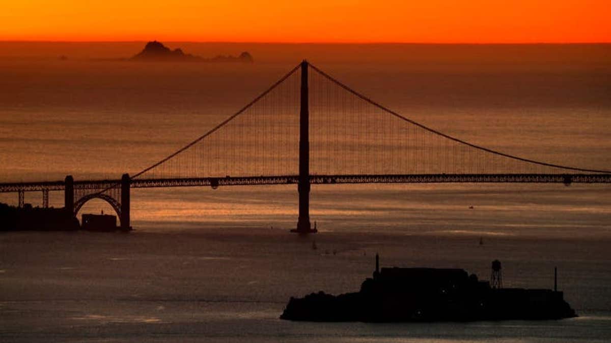 End of day as the sun sets with the Farallon Islands, Golden Gate Bridge and Alcatraz island, seen from the Oakland hills , Calif., on Tuesday Feb. 6, 2018. (Photo By Michael Macor/The San Francisco Chronicle via Getty Images)