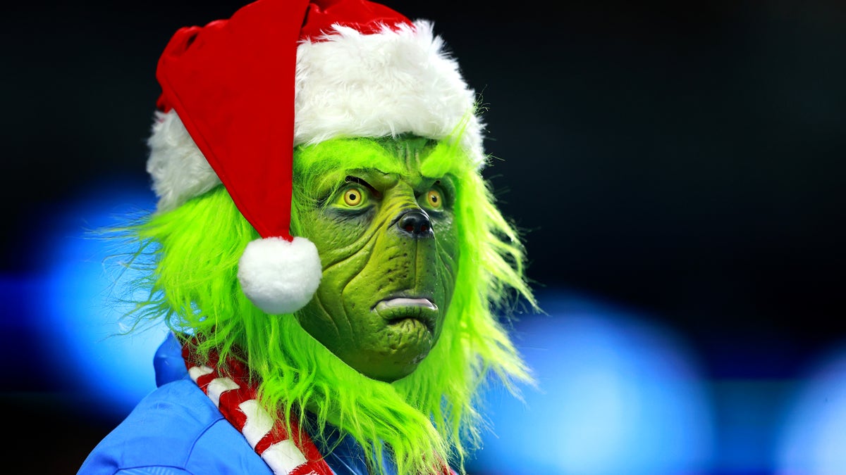 Detroit Lions fan dressed as a grinch in Detroit, Michigan