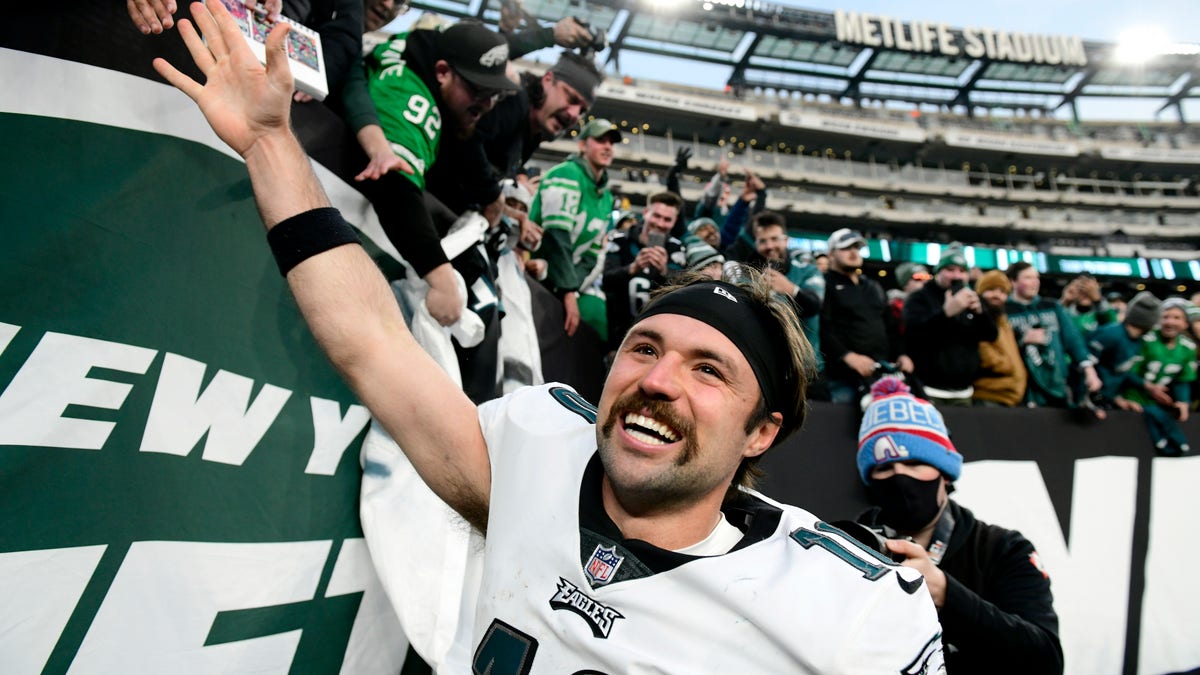 EAST RUTHERFORD, NEW JERSEY - DECEMBER 05: Gardner Minshew #10 of the Philadelphia Eagles celebrates as he runs off the field after defeating the New York Jets 33-18 at MetLife Stadium on December 05, 2021 in East Rutherford, New Jersey. 