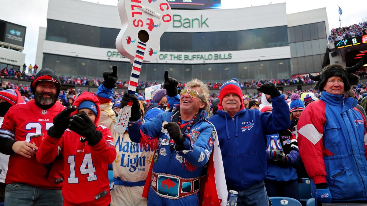Buffalo Bills fans celebrate a touchdown in the third quarter of the game against the Carolina Panthers at Highmark Stadium on Dec. 19, 2021 in Orchard Park, New York. 