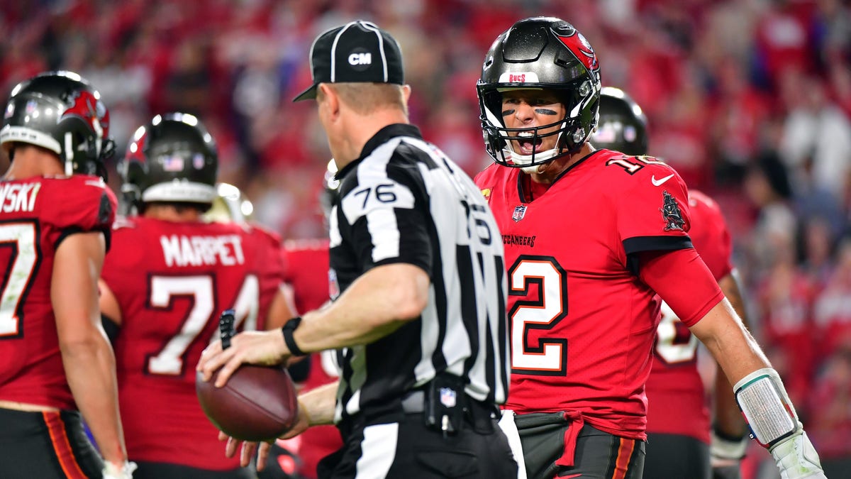 Tom Brady (12) of the Tampa Bay Buccaneers yells at a referee during the fourth quarter of the game against the New Orleans Saints at Raymond James Stadium on Dec. 19, 2021, in Tampa, Florida.