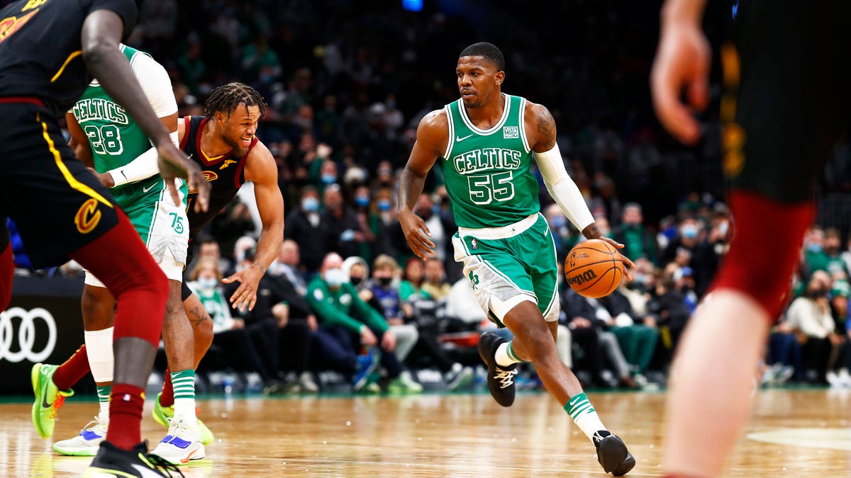 Joe Johnson #55 of the Boston Celtics brings the ball up court during the fourth quarter of the game against the Cleveland Cavaliers at TD Garden on Dec. 22, 2021 in Boston, Massachusetts. 