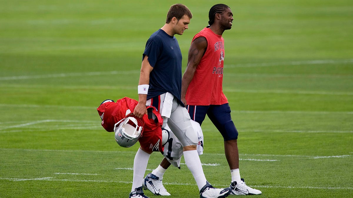 Is Tom Brady trying to recruit Randy Moss to the Buccaneers?