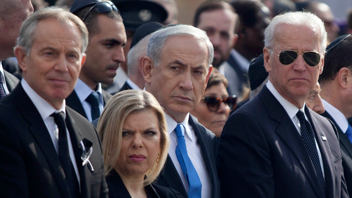 Then-US Vice President Joe Biden, right, and Israeli Prime Minister Benjamin Netanyahu and his wife Sara, center, and Former British Prime Minister Tony Blair, left, during a state memorial service for Israel's former Prime Minister Ariel Sharon at Israel's parliament, the Knesset on Jan. 13, 2014, in Jerusalem.