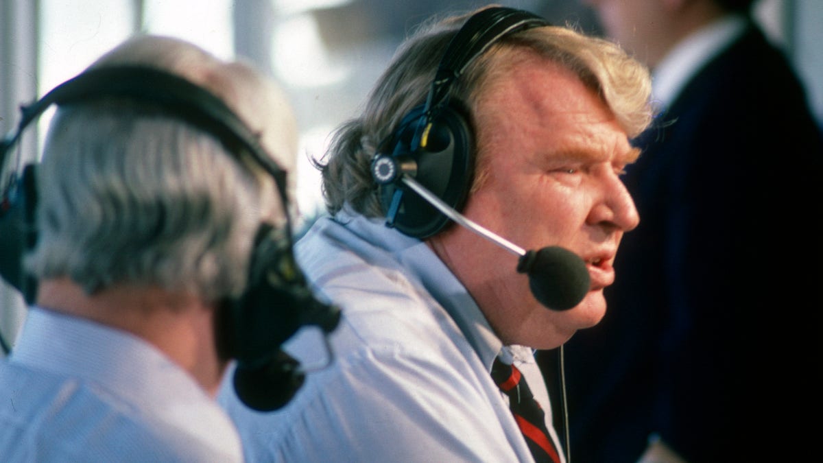 CBS NFL commentator Pat Summerall (left) and NFL analyst John Madden (right) on the air during an NFL Football game circa 1986. 