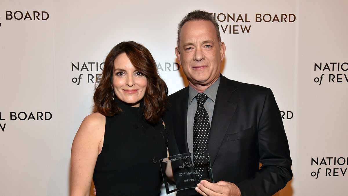 Tina Fey and Tom Hanks are seen in New York City, Jan. 9, 2018. The two supported guest host Paul Rudd during a scaled-down show Saturday. 