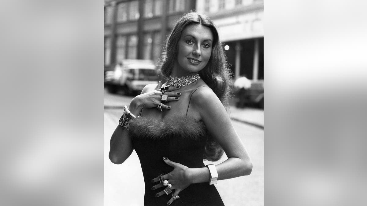 Model Marilyn Cole modeling a £50,000 necklace designed by Ernest Blyth
